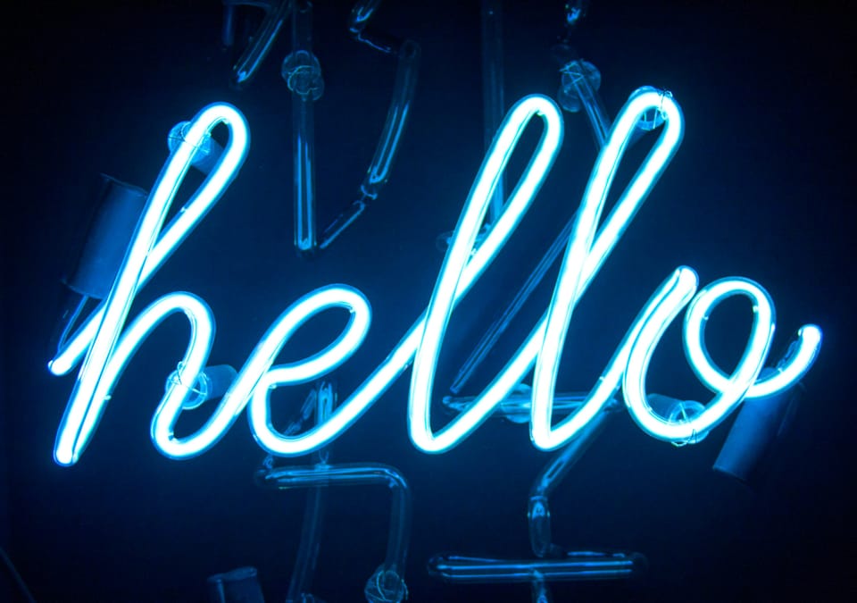 Blue neon hello sign